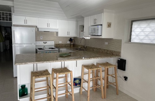 Spring Garden Apartment | Best Balcony On the Beach! nBeachfront at It’s Best! n