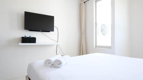 Surabaya Apartment | Best Deal and Comfy Studio at Puncak Kertajaya Apartment By Travelio