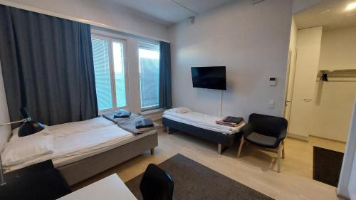 Jyvaskyla Apartment | Best location city center studio with balcony and free parking Kotimaailma apartments