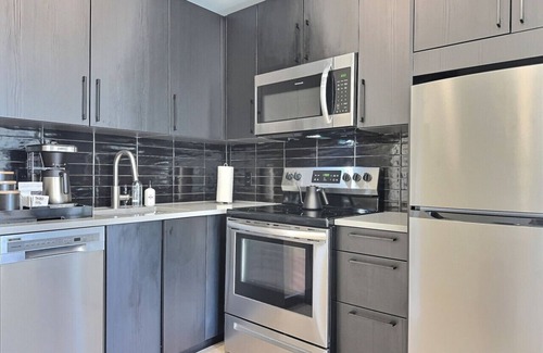 Five Points South Apartment | Bham Studio | Tesla Rides + Gym + Walkability