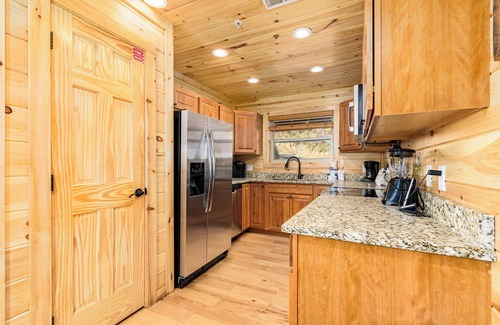 Gatlinburg Cabin | Big Sky: Mountain-Side Cabin Surrounded by Majestic Views Only 2 Miles from Gatlinburg