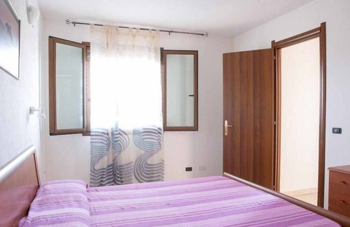 Torre di Bari Apartment | Bilocale 3 Torre di Barì with covered veranda and outdoor furniture
