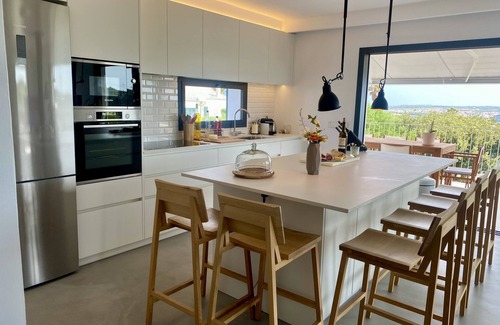 Cala Llonga Ski Chalet | Bini Moxonia Luxury Villa with sea views and spectacular garden