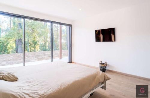 Biscarrosse Villa | Biscarrosse Lac Villa de charme PMR climatisée avec vue sur le golf pour 8/10 personnes