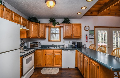 Swanton House | Black Bear Retreat | Covered Porch + Hot Tub