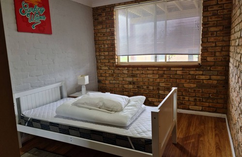 Black Head House | Black Head Beach 5bed ocean views 200m from Patrolled Black Head Beach