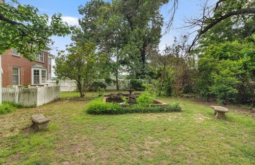 Fort Smith House | Blooming Garden with king size bed, smart tv, private bath, game room and more!