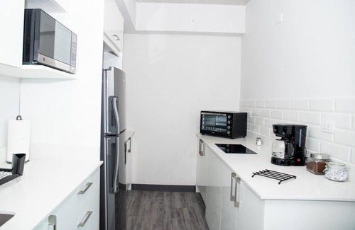 Hospital Apartment | Blue Nun at 29, City Views and Wonderland Vibes!