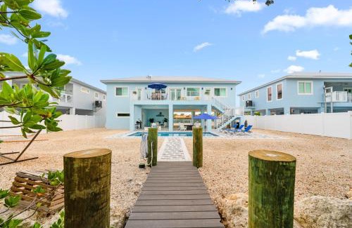Marathon Villa | Blue Pearl New Waterfront Haven with Heated Pool ,70 Foot Dock, and More!