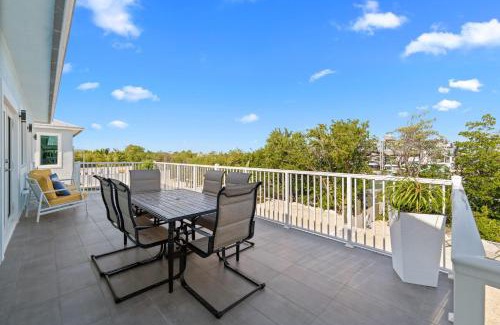 Marathon Villa | Blue Pearl New Waterfront Haven with Heated Pool ,70 Foot Dock, and More!