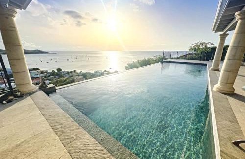 Grand Case Villa | Blue Room in a shared Villa Diamant with communal pool and sea view