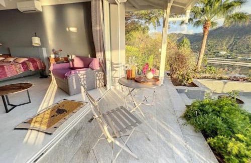 Grand Case Villa | Blue Room in a shared Villa Diamant with communal pool and sea view