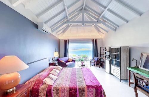 Grand Case Villa | Blue Room in a shared Villa Diamant with communal pool and sea view