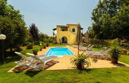 Roda Apartment | Blue wave beach villa with pool 100m from the beach