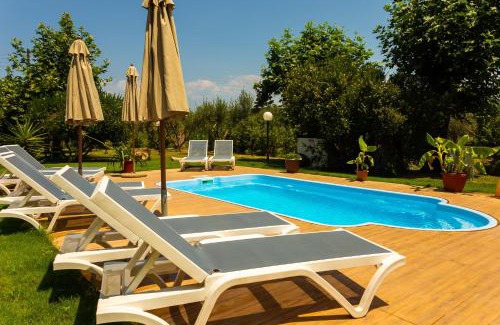 Roda Apartment | Blue wave beach villa with pool 100m from the beach