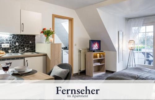 Schneverdingen Apartment | Blumenvilla 6 mit Küche, Balkon, Sauna und Garten