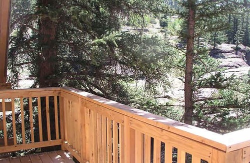 Lake City House | Bobcat Log home 4 bd 2 bth on the river waterfall view porch ATV drive-in/out