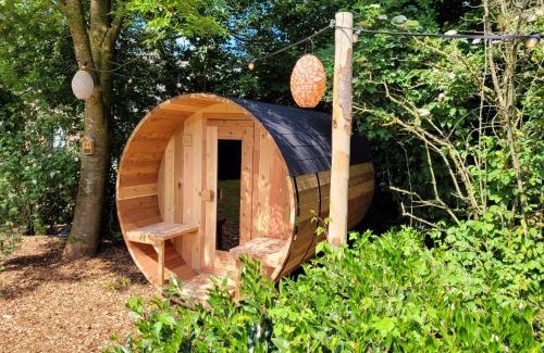 Ewijk House | Bohemian Wellness met hottub & sauna