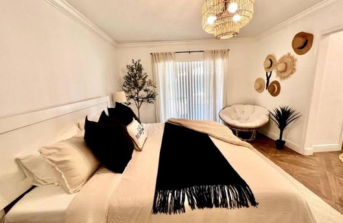 Bayshore Gardens House | Boho House with heated Pool and Spa