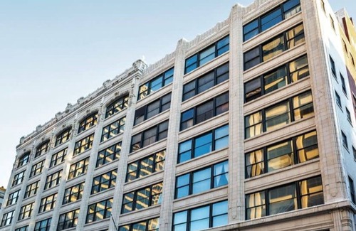 Wholesale District Apartment | Bold 2BR 2BA In The Block Apartment by Cozysuites