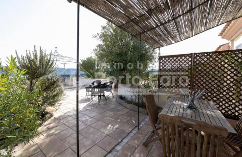 Capo d'Orso Apartment | Borgo dell'orso - Villetta a schiera ai piedi della Roccia dell'Orso