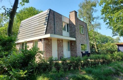 Den Hout House | Boshuis Golfzicht "Wellness, Golf & Nature"