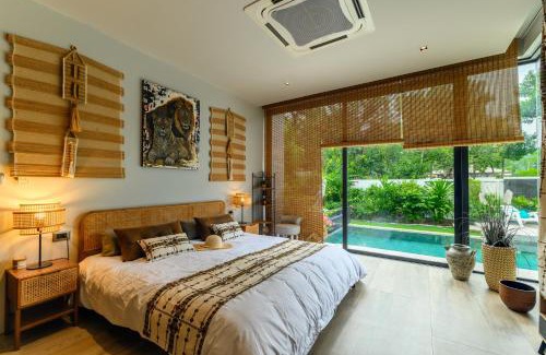 Si Sunthon Villa | Botanica Modern Loft by RESAVA