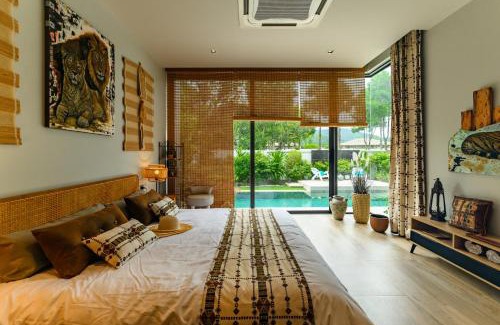 Si Sunthon Villa | Botanica Modern Loft by RESAVA