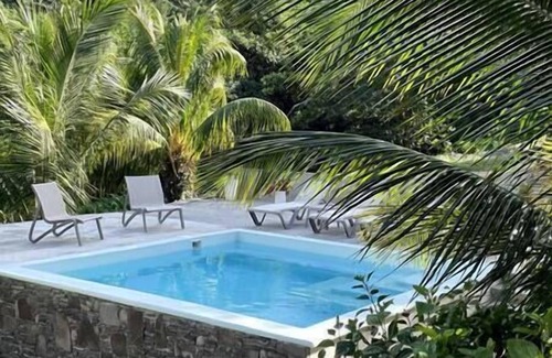 Calibishie Apartment | Bougainvillea Garden Caribbean suite with pool