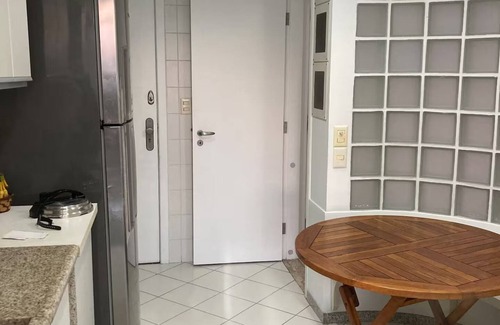 Zona Sul Apartment | Apartment in Jardim Botânico - safe neighborhood and view of the lake with sunset