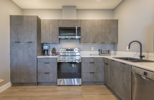 Silver Star Mountain Apartment | Brand new suite with garage, private laundry, and gear room