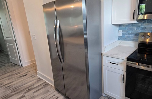 Gulfport House | Brand New Spacious 5BR, 4BA house Built Aug 25, 85 in TV, GameRoom, New Special