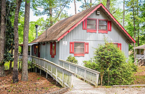 Pine Mountain Ski Chalet | Breathtaking view of Lake Innsbruck right from your own screened in porch.