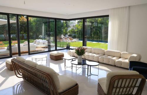 Herzliya Pituach Apartment | Breathtaking Villa w Pool & Sauna Near the Beach by Sea N' Rent