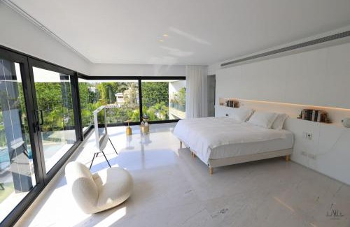 Herzliya Pituach Apartment | Breathtaking Villa w Pool & Sauna Near the Beach by Sea N' Rent