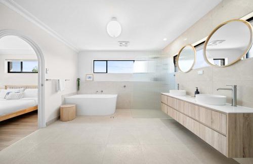 Woorim House | Bribie Beach House with Pool - Walk to Surf & Shops