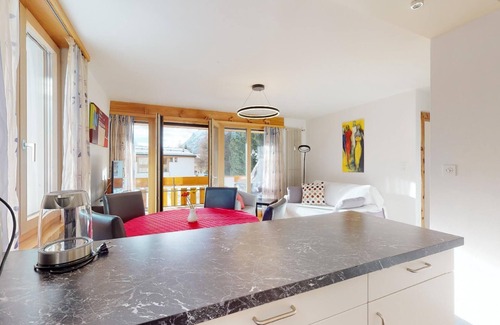 Surlej Apartment | Bright 2-room apartment approx 45m2 on the 1st floor (2nd mezzanine), in a quiet