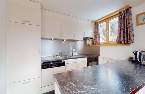 Surlej Apartment | Bright 2-room apartment approx 45m2 on the 1st floor (2nd mezzanine), in a quiet