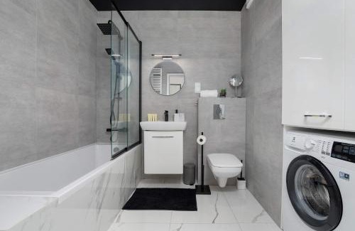 Rzeszow Apartment | Bright Apartment with Balcony near Lake Żwirownia by Noclegi Renters