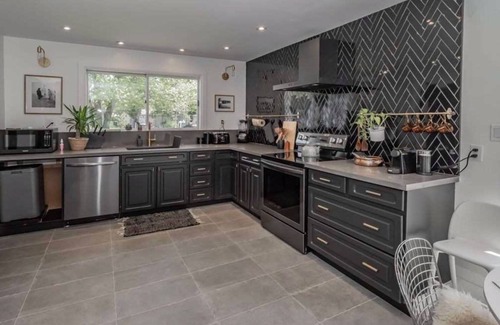 Lagoon City Cottage | Bright Modern Waterfront Cottage w/hot tub - 5 min from the beach!