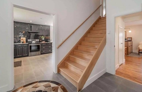Lagoon City Cottage | Bright Modern Waterfront Cottage w/hot tub - 5 min from the beach!