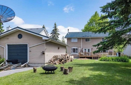 Lagoon City Cottage | Bright Modern Waterfront Cottage w/hot tub - 5 min from the beach!