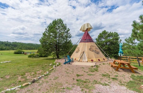 Hot Springs RV Rental | Buffalo Glamping Tipi with King Bed in Black Hills