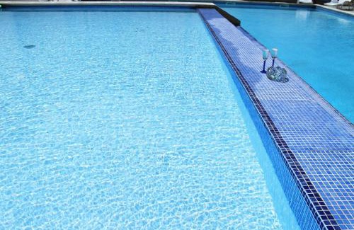 Bugibba Apartment | Bugibba Deluxe Penthouse with terrace & communal swimming pool