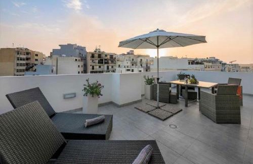 Bugibba Apartment | Bugibba Deluxe Penthouse with terrace & communal swimming pool