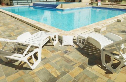 Bugibba Apartment | Bugibba Deluxe Penthouse with terrace & communal swimming pool