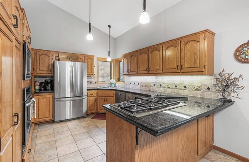 Andover House | Bunker Hills House - Near Trails! 2 Kitchens and Living Spaces