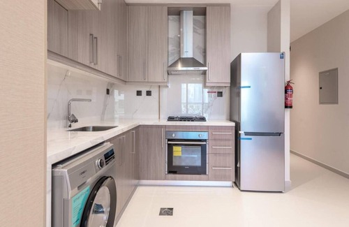 Dubai Sports City Apartment | Burj Dreams - Luxe Studio Stay