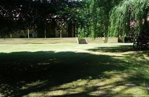 Buxton House | Buxton Gardens by the RivernCountry style home, river flowing thru the backyard