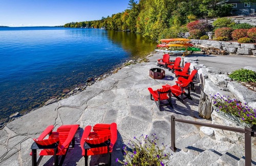 Bobcaygeon Cottage | Expansive luxury cottage on Pigeon Lake! 2 Bunkies, Watertoys and Firepits!